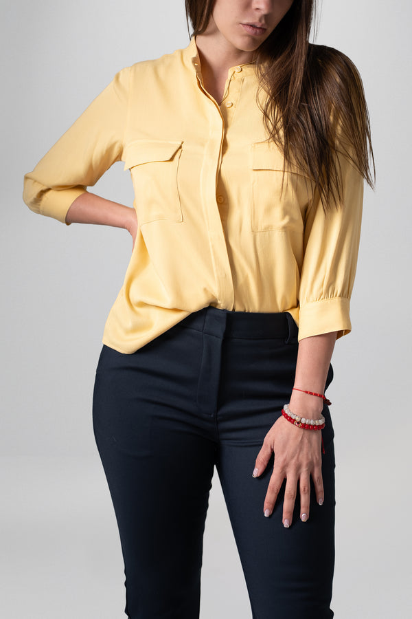 Blusa manga 3/4 con bolsillos frontales